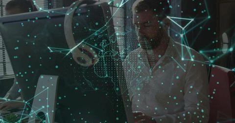 Tech innovators collaborating in modern office with digital network overlay