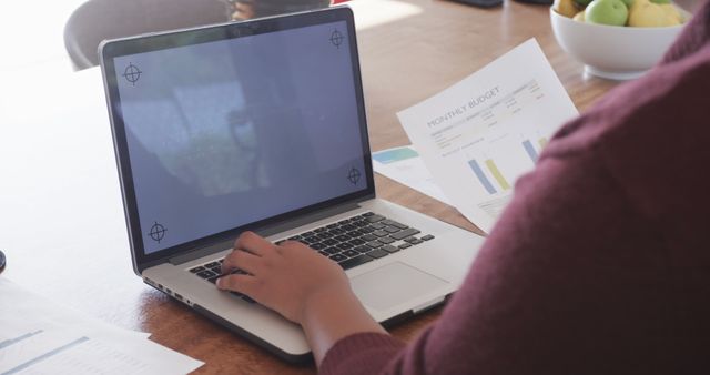 Person Working on Financial Budget Plan at Home with Laptop and Documents - Download Free Stock Images Pikwizard.com