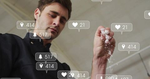 Chef sprinkling salt surrounded by floating social media icons