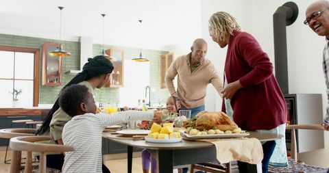African American Multigenerational Family Enjoying Thanksgiving Dinner