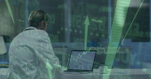 Financial Analyst Monitoring Stock Trends on Laptop with Positive Growth