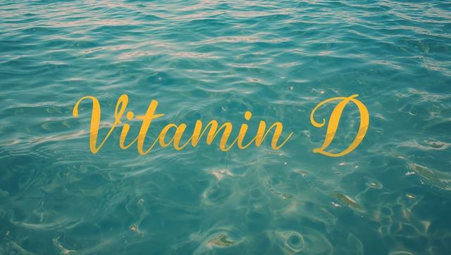 Vitamin d cursive text floating over teal ocean ripples sunlight wellness concept summer lifestyle