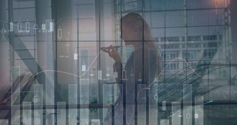 Businesswoman Discussing Market Stats Over Phone in Modern Office