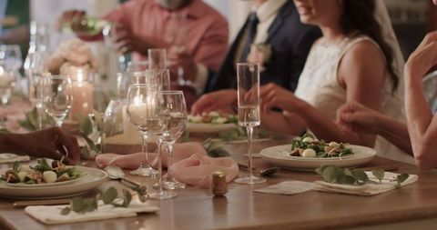 Luxurious wedding dinner celebration with elegantly decorated table