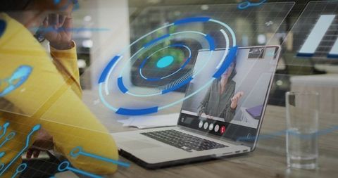 Connecting teams through augmented reality video meeting on laptop in modern workspace