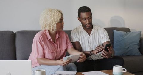 Friends Collaborating and Natural Setting on Project Using Smartphone