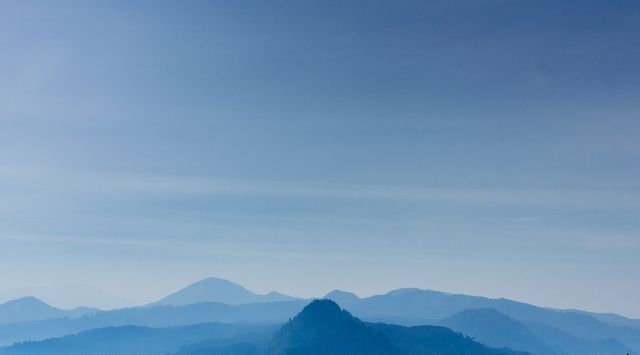 Serene Mountain Landscape Under Clear Blue Sky - Download Free Stock Photos Pikwizard.com