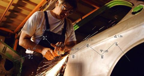 Mechanic grinding car body panel with angle grinder and ar overlays, sparks flying