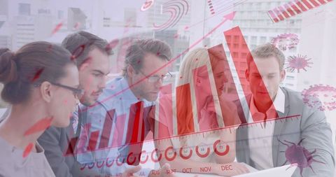 Business Team Analyzing Covid-19 Data in Modern Office