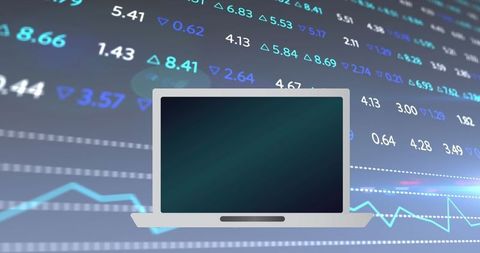 Laptop Displaying Financial Data with Stock Market Charts