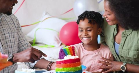 Family Birthday Celebration with Rainbow Cake at Home