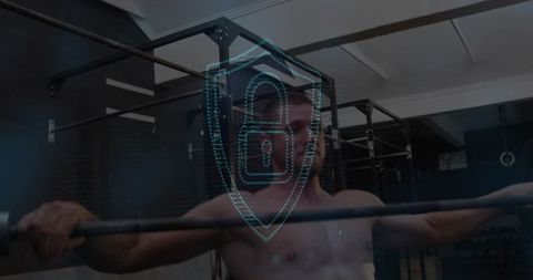 Muscular athlete lifting barbell with holographic lock shield showing fitness data protection