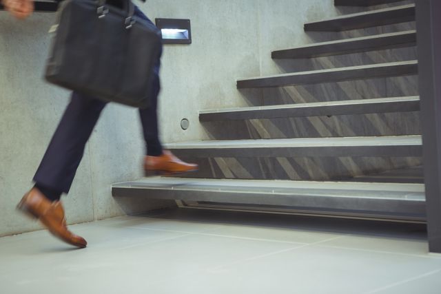 Businessman Climbing Office Stairs with Briefcase - Download Free Stock Photos Pikwizard.com