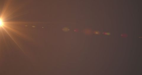 Abstract Glowing Light Flare on Orange Background - Download Free Stock Images Pikwizard.com