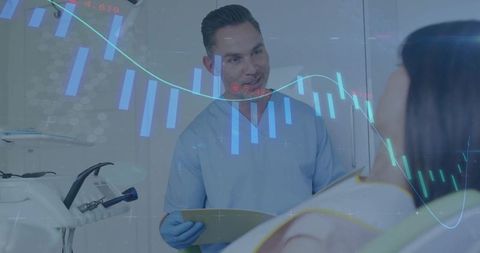 Dentist in Clinic Analyzing Patient Data with Digital Technology Integration