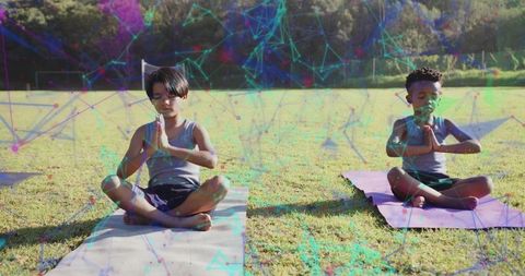 Young Boys Meditating Outdoors With Geometric Digital Overlay