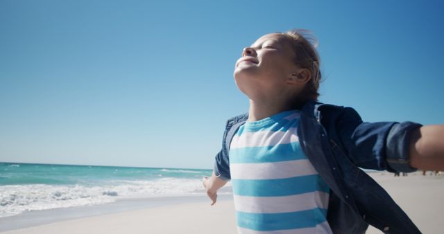 Happy Child Enjoying the Beach and Sun - Download Free Stock Images Pikwizard.com