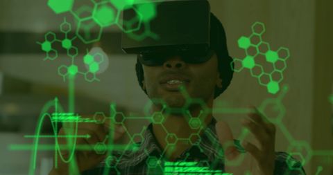 Young Man Engaging with Futuristic VR Interface for Scientific Data - Download Free Stock Images Pikwizard.com