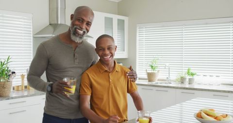Happy Father and Son Bonding in Modern Kitchen