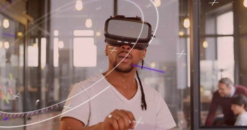 Innovative vr developer in modern coworking space with augmented reality elements