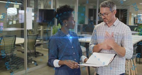 Coworkers Collaborating on Digital Telecommunications Solutions