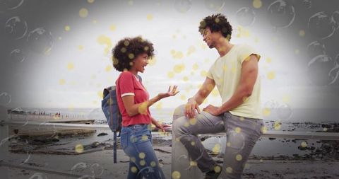 Cheerful Couple Enjoying Romantic Beachside Adventure