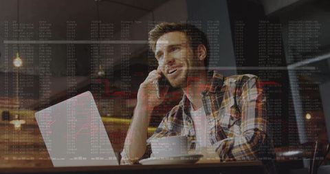 Freelance developer calling while coding on laptop at cafe with code overlay