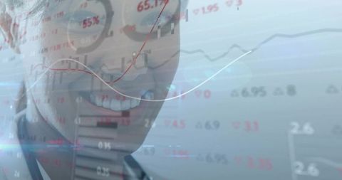 Smiling businesswoman in round eyeglasses and blazer displaying overlaid stock charts