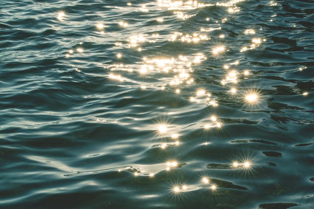Sunlight Reflecting on Rippling Water Surface - Download Free Stock Photos Pikwizard.com