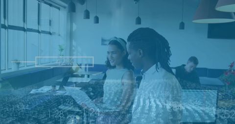 Diverse professionals collaborating in data-driven office