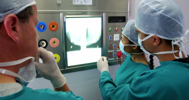 Doctors Examining X-ray Images in Medical Facility - Download Free Stock Images Pikwizard.com