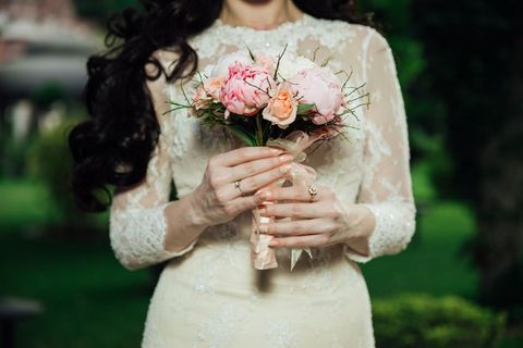 Elegant Bride Bridel With Petite Floral Bouquet in Green Garden