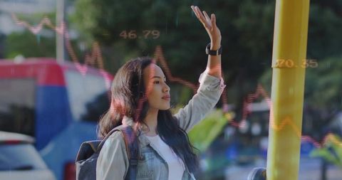 Urban commuter hailing bus with overlaid stock market graphics