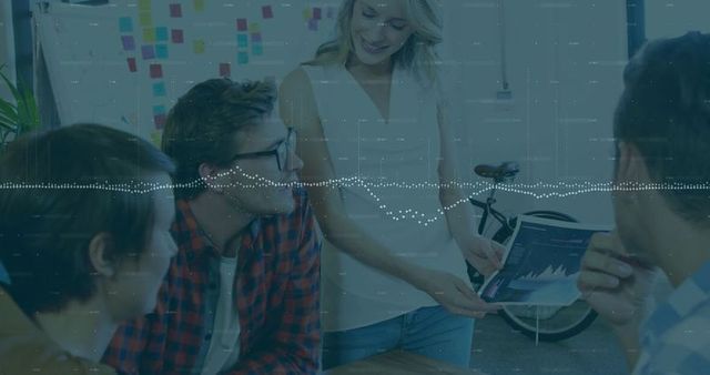 Woman Leading Team Meeting with Data Chart in Sleek Office