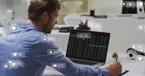 Focused developer coding on laptop with analytics and social overlays in modern workspace