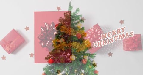 Festive Christmas Tree with Gift Boxes and Metallic Bows