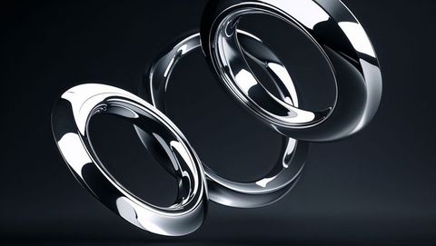 Futuristic Metallic Torus Shapes in Floating Rotation