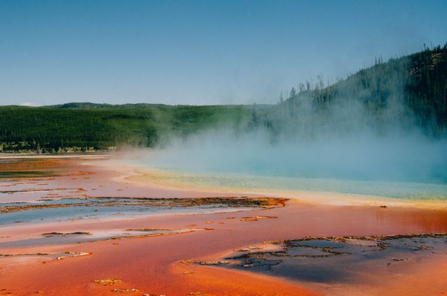 Vibrant Hot Spring in Yellowstone National Park under Clear Sky - Download Free Stock Photos Pikwizard.com
