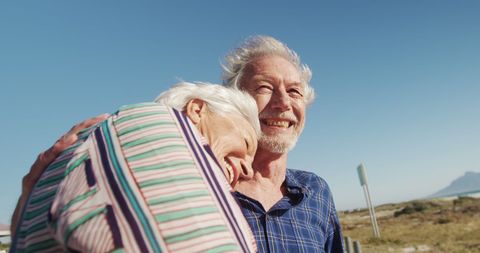 Joyful Senior Couple Enjoying Day at the Beach - Download Free Stock Images Pikwizard.com