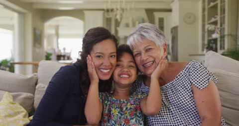Multigenerational Family Smiling Together at Home