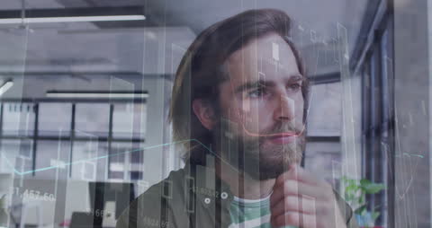 Thoughtful Man Analyzing Digital Financial Data in Office