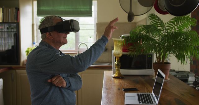 Senior Man using VR Headset for Virtual Reality Experience at Home - Download Free Stock Images Pikwizard.com