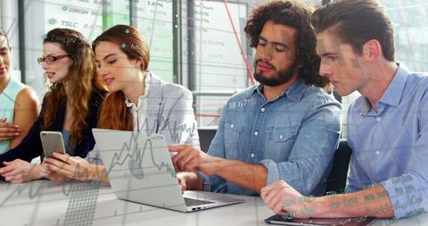 Diverse Team Analyzing Financial Data on Devices - Download Free Stock Images Pikwizard.com