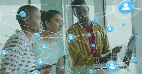 Coworkers Discussing Digital Network Innovation in Modern Office