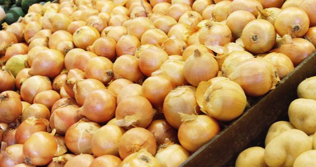 Organic Yellow Onions Piled in Grocery Store Bin - Download Free Stock Images Pikwizard.com