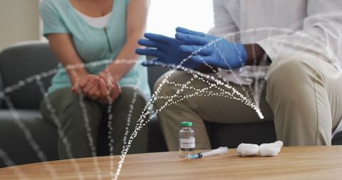 Doctor and Patient Consultation with DNA Strand Overlay