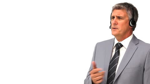 Mature Businessman Using Headset for Professional Communication