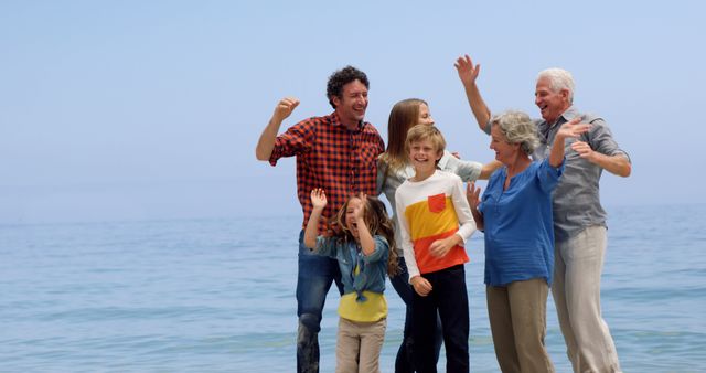 Happy Multigenerational Family Celebrating on a Beach - Download Free Stock Images Pikwizard.com