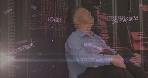 Man in Data Center with Overlay of Numbers, Cybersecurity Concept