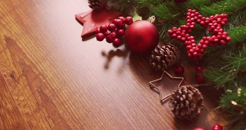 Festive Christmas Decorations on Wooden Table - Download Free Stock Images Pikwizard.com